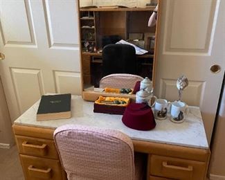 oak vanity with marble top, mirror and chair