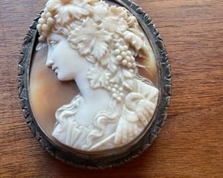 Antique conch shell cameo with sterling bezel