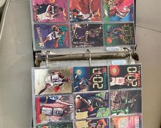 Album filled with basketball rookie and pro cards