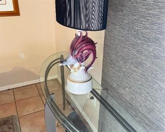 contemporary glass console table and Dresden bird of paradise lamp