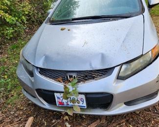 tagged and running Honda, 2012 Civic, with Eco Boost/ECON