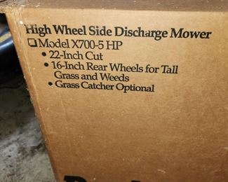 new, in box, Poulan high wheel lawnmower