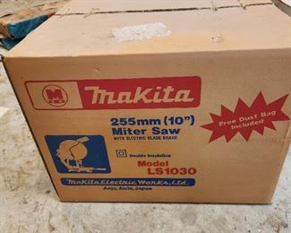 New, never opened Makita miter saw