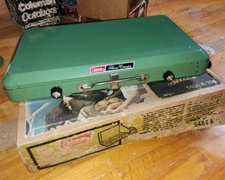 never used, vintage Coleman camping, appear unused, in original boxes. CampStove 5400, lantern 5114, snow-lite green jug 1 gallon 5501