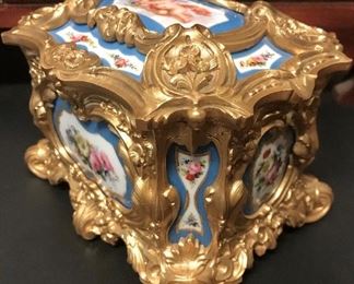 Sevres, porcelain & bronze mounted jewelry casket, hand painted cherub & floral design, velvet lined, with lock & key, 19th c                                                 4.5”d x 6.25”l x 4.5”h
$2800
PENDING