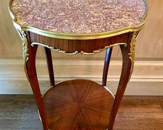 Louis XV style side table
marble top ormolu mounts & round shelf, late 19th c, France, as is (marble restored)
18.5” x 20” x 28.75” h
$800
