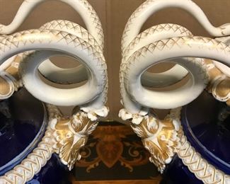 Detail
Pair Meissen, porcelain Serpent, Schlangenvasen vases/urns, cobalt, ivory & gilt, mid-19th c
each 8”d x 12.5”w  x 19”h 
(1 handle professionally repaired) 
$2600

