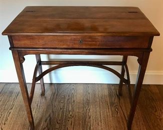 Closed
Theodore Alexander “Campagne” flip-top leather top writing desk                    28” x 17”/27” x 31.25”/35.25”
SOLD