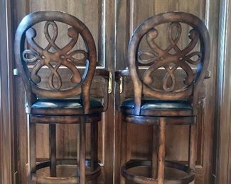 Pair Frontgate scroll back swivel barstools with black leather seats
22” x 20 x 48” h seat 30.5” h
$950
PENDING