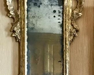 Pair 18th c Italian carved & giltwood  framed mirrors, original mirrors, minor gilt loss
30” x 14.75”

$3500