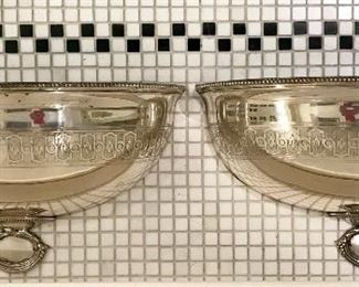 Vintage silver plate dome
custom made/halved  
as wall pockets/planters

$500