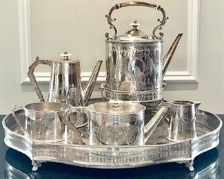 Elkington & Co Silver plate  #8023
4 piece coffee/tea service monogrammed
missing sugar lid
$500

Silver plate kettle on tilt stand
chased & pierced
Early 20th c
$300

Sheffield 
serving tray with gallery
silver on copper pierced & footed
scattered silver loss
17” x 24” x 3”
$150