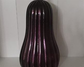 Eggplant light. Has sparkle lights. Battery operated.