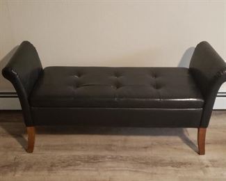 Leather bench with storage.