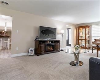 Color changing remote control fireplace TV console.