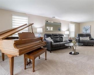 Antique baby grand, newly refinished. Original ivories. Tuned annually and played.