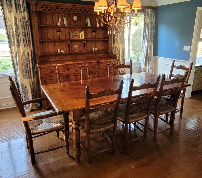 Fantastic harvest style vintage table and 8 chairs. Matching English court cupboard...sold separately. 