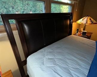 Queen Bed Frame includes Headboard with padded Vegan Leather Back and complete Bed Sides and Foot Board. Mattress is Simmons Beautyrest NXG 300 Firm Foam Hybrid Mattress with Leggett and Platt Adjustable Base.