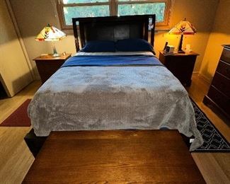 Queen Bed Frame includes Headboard with padded Vegan Leather Back and complete Bed Sides and Foot Board. Mattress is Simmons Beautyrest NXG 300 Firm Foam Hybrid Mattress with Leggett and Platt Adjustable Base.