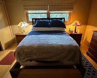 Queen Bed Frame includes Headboard with padded Vegan Leather Back and complete Bed Sides and Foot Board. Mattress is Simmons Beautyrest NXG 300 Firm Foam Hybrid Mattress with Leggett and Platt Adjustable Base.