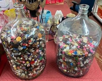 Glass Water Bottles Full of Buttons