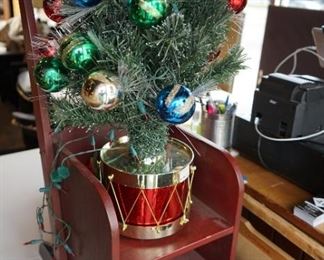 Sleigh and small decorated tree