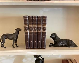 Leather-Bound Books. And Bronze Dog Figurines.