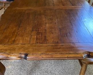 French Provincial Extension Dining Table. Measures 71 - 110" L x 44" W x 30" H with 24" Clearance. Has Two 20” Leaves. Photo 3 of 4.