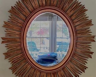 Large-scale Gilt Oval Starburst Mirror.