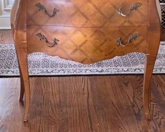 Two-Drawer Bombe Chest with Diamond Lattice Marquetry and Brass Pulls. Measures 33” W x 14” D x 32” H. Photo 1 of 2.