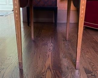 Pair of Wellington Hall Pembroke Tables with Satinwood Trim. Each Measures 20” W x 28” D x 26” H. Measures 37” W Fully Extended. Each Side is Photo 1 of 2.