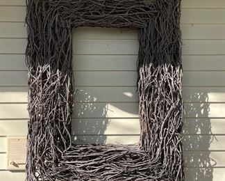 Large-Scale Decorative Frame Crafted From Twigs.