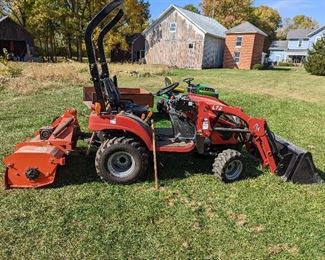 Rural King L72 Tractor with Bucket & Rototiller Attachments