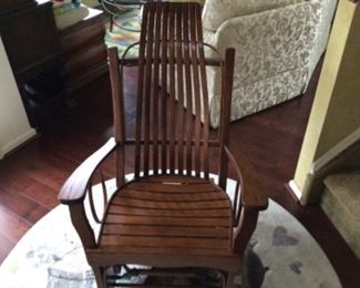 Bent rocker and swivel base chair