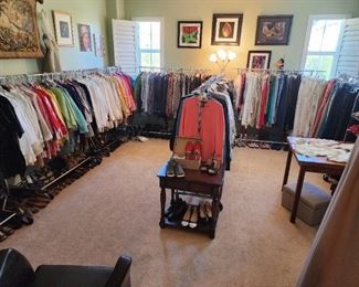 Tops, pants and shoes. This is one of 5 rooms full of clothing. Clothing sizes M-XL, shoe sizes 6 1/2 - 7 1/2