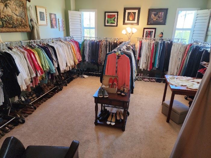Tops, pants and shoes. This is one of 5 rooms full of clothing. Clothing sizes M-XL, shoe sizes 6 1/2 - 7 1/2