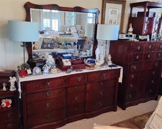 Table Rock solid wood bedroom set. 6 drawer tall chest of drawers, 12 drawer long dresser, 2 nightstands, 1 large dresser mirror.