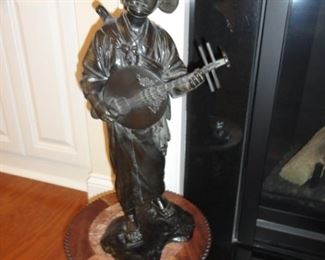 Bronze Man playing Moon Guitar 21" Tall
