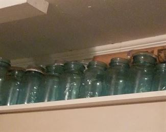 Collection of blue ball jars and bottles