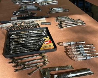Multiple sets of craftsman sockets and wrenches in both metric and standard sizes