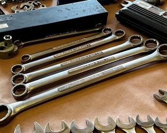 Multiple sets of craftsman sockets and wrenches in both metric and standard sizes