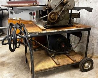 Cast-iron heavy duty 12 inch planer missing original cover but has replacement cover