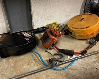 Shop light and air hose with retractors