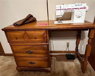 Sewing machine and table