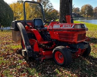 KUBOTA B1750 All Wheel Drive turns on a dime..with mower deck, rear leaf catcher/bagger, rear mount blade, well maintained, all new rubber, very good condition.