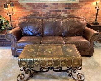 Leather sofa; leather "book" coffee table with metal base
