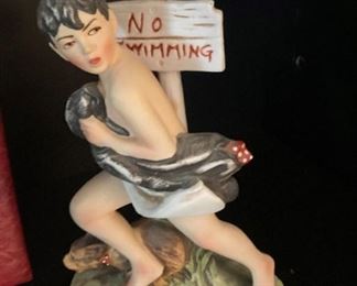 Normal Rockwell figure "No Swimming"