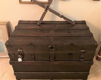 Antique trunk; cross made of spikes