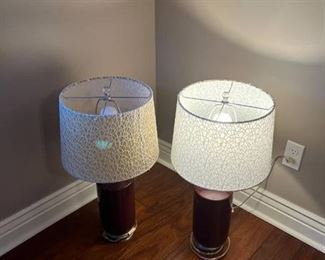 Set of two lamps with crochet shades 27 high one white shade and the other is beige