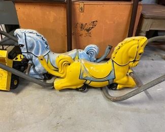 Vintage plastic/metal carousel horses.